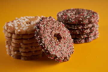 Christmas biscuits on yellow