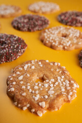 Christmas biscuits on yellow