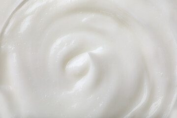 Texture of white body cream, closeup view