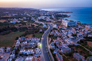 Obraz premium Panoramic view from above to Protaras. Evening landscape in Cyprus. Hotels and tourist infrastructure in Cyprus. Cape Capo Greco