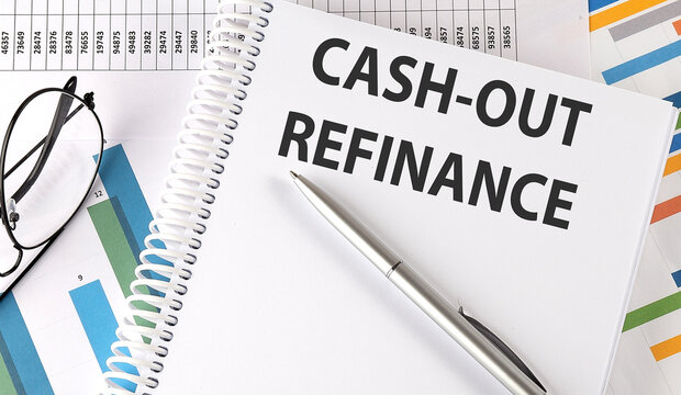 CASH-OUT REFINANCE text , pen and glasses on the chart