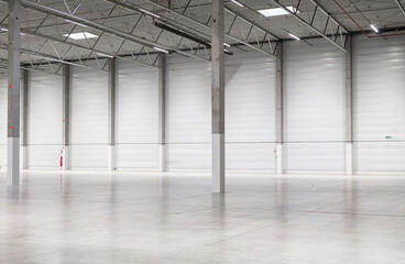 Clean and empty industrial hall in detail for supporting poles