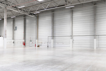 Clean and empty industrial hall in detail for supporting poles