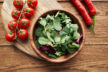 a plate of lettuce cherry tomatoes cooking ingredients organic healthy food