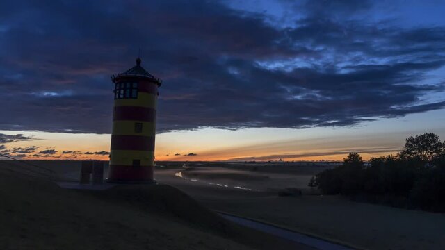 Pilsumer Leuchtturm im Zeitraffer, an der Nordsee Sonnenaufgang