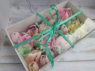 sweet marshmallow in the form of flowers. Festive dessert.	