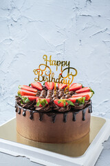 Chocolate cake with chocolate ganache and fresh strawberries