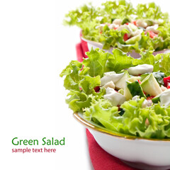 Green salad with lettuce, cucumber, zucchini, strawberries and mayonnaise