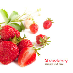 Fresh garden strawberry with green leaf on the white background