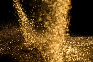 Fototapeta premium Gold particle dust for background