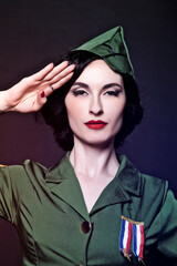 Portrait of a Pinup Burlesque Diva performing in military dress