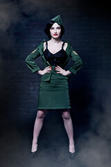 Portrait of a Pinup Burlesque Diva performing in military dress