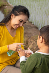 a mother uses antiseptics for her son