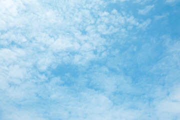 Fototapeta na wymiar White clouds are soft and fluffy floating on blue sky for backgrounds concept, Selective focus