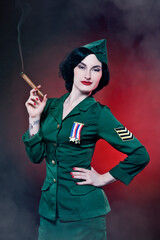 Portrait of a Pinup Burlesque Diva performing in military dress, smoking cigar