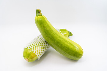 Fresh zucchini on pure white background