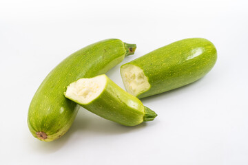 Fresh zucchini on pure white background