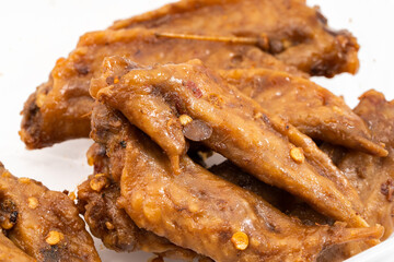 Spicy duck wing tip on pure white background