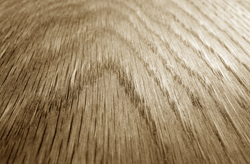 Old oak board texture as background with blur effect in brown tone.