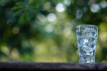 Glass of clear drinking water and ice