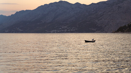 Obraz premium Lonely boat in the Sea