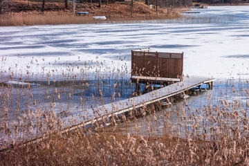 Jetty in a frozen lake