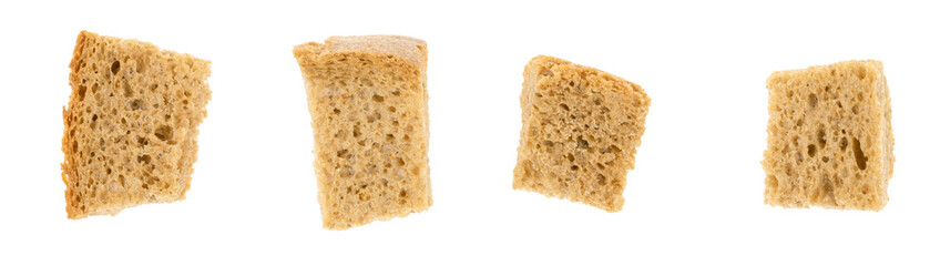 Baked crackers isolated white background close up. heap small pieces dried bread. crumbs of bread croutons
