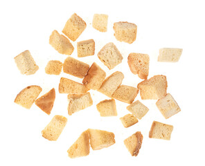Baked crackers isolated white background close up. heap small pieces dried bread. crumbs of bread croutons