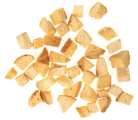 Baked crackers isolated white background close up. heap small pieces dried bread. crumbs of bread croutons