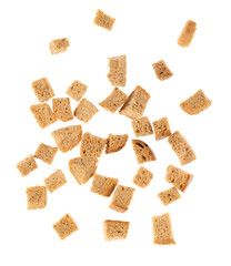 Baked crackers isolated white background close up. heap small pieces dried bread. crumbs of bread croutons