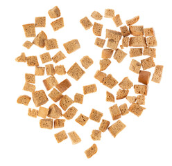 Baked crackers isolated white background close up. heap small pieces dried bread. crumbs of bread croutons