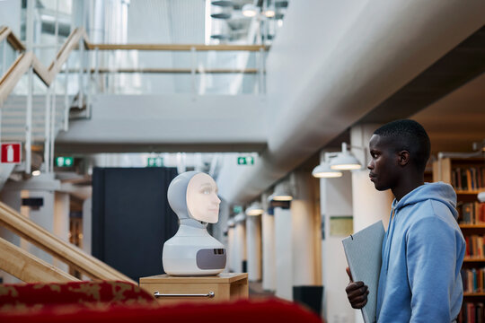 Student using voice assistant in library