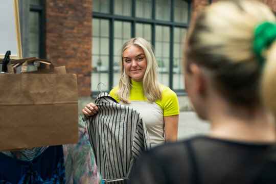 Young woman at yard sale
