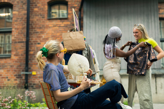 Young women at yard sale