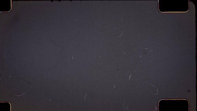 35mm Film Matte with vintage film sprocket perforations and damaged grain 4K Video Overlay