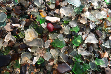 colourful shards of glass polished by sea   