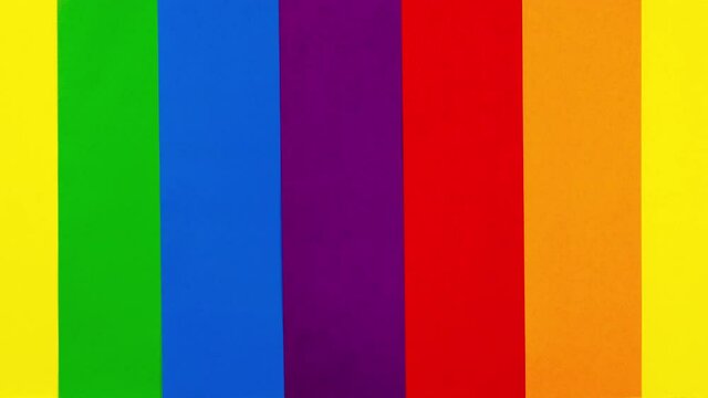 4k Looped motion of six rainbow colors. Multicolor Background. LGBT flag, community, sexuality and gender identity concept. Stop motion animation.