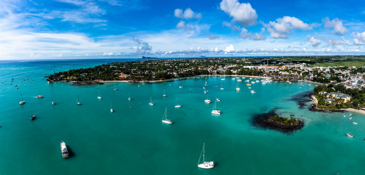 Idyllic sea by townscape of Trou Aux Biches at Mauritius, Africa