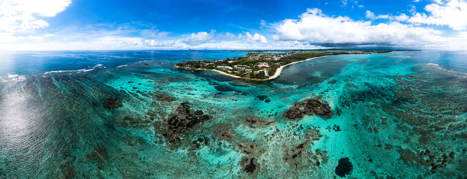 Mauritius, Pamplemousses District, Trou-Aux-Biches, Helicopter panorama of turquoise waters of Indian Ocean in summer
