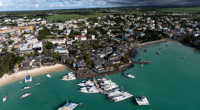Harbor by townscape at Trou Aux Biches at Mauritius, Africa