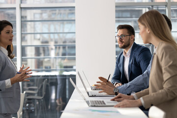 	
Group of business people at the conference.Lead manager doing presentation about business strategy and new projects.	
