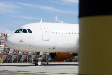 New plane waiting to be towed to the gate