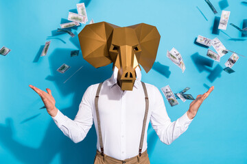 Photo of young man wealthy win lottery bat weird africa hold hands isolated over blue color...