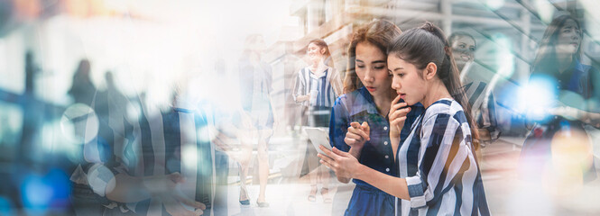 Double exposure of two businesswoman using smartphone, social online technology concept.