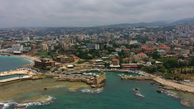 Aerial Panning Beautiful Shot Of Houses In City, Drone Flying Over Sea - Byblos, Lebanon