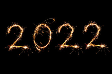 2022 written with Sparkle firework on black background, happy new year 2020 concept