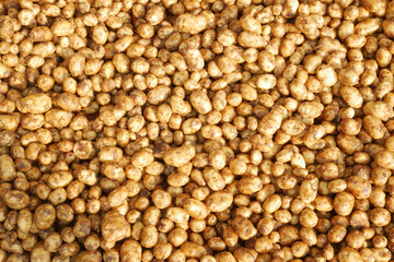 Close up of slice of raw potato in a bowl 