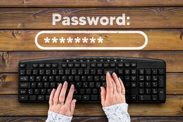 woman hands on pc keyboard and  and password on on wooden desk
