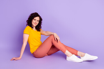 Full body profile side photo of young attractive woman good mood sit floor isolated violet color background