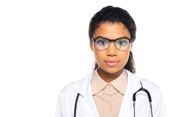 Portrait of african american doctor in eyeglasses looking at camera isolated on white.